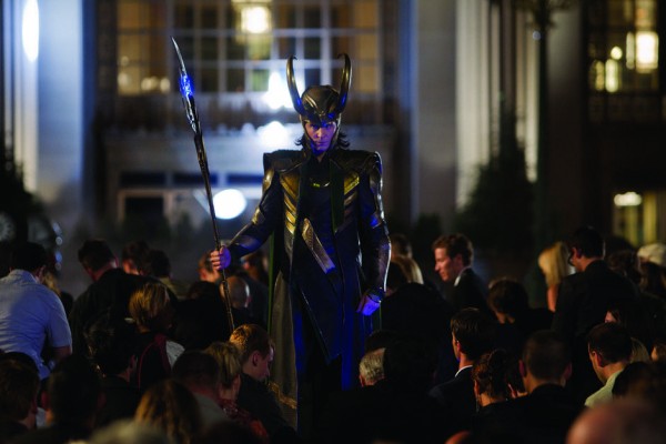 The people kneel before Loki 